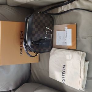 Authentic Louis Vuitton Santa Monica handbag/crossbody.